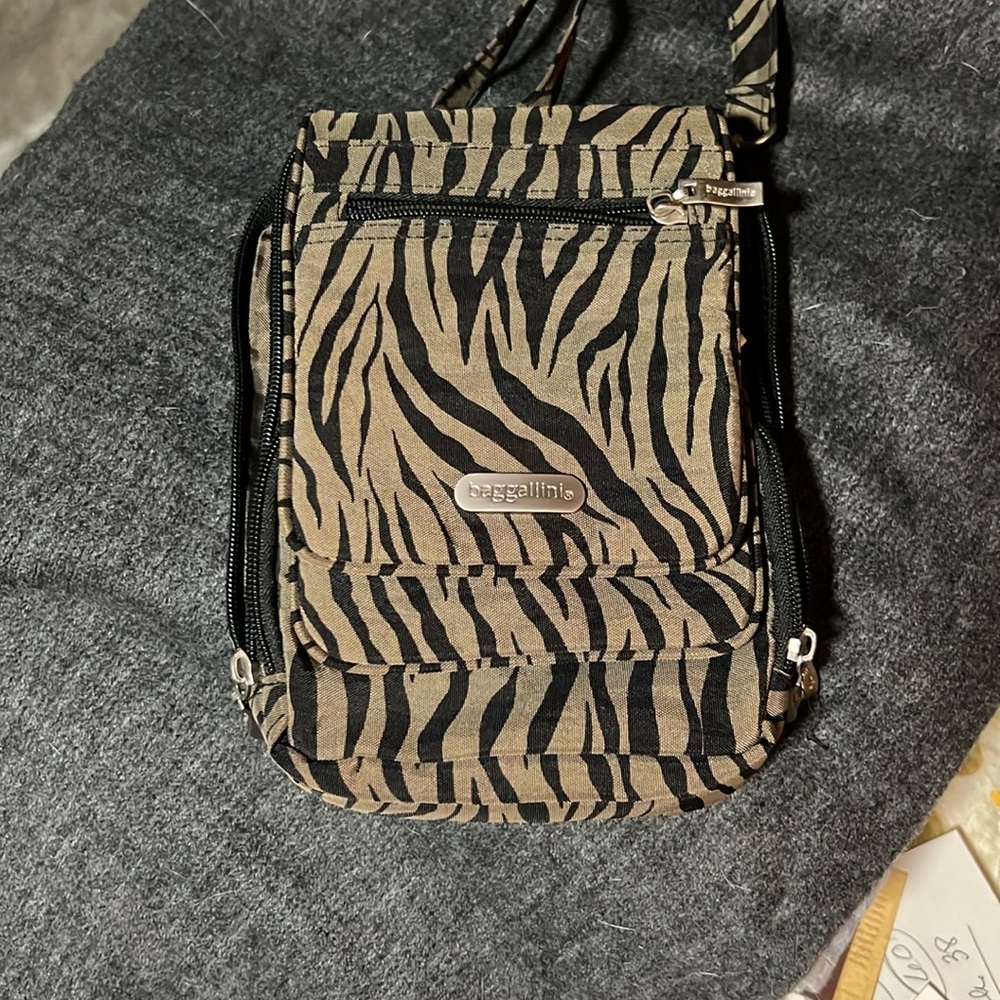 Baggallini travel crossbody. More pockets for all your travel needs!